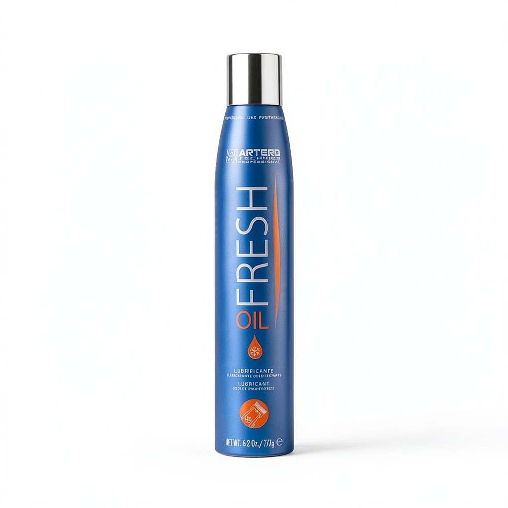 Installing Clipper Blade Spray ARTERO Grooming Lubricant on a wooden grooming table